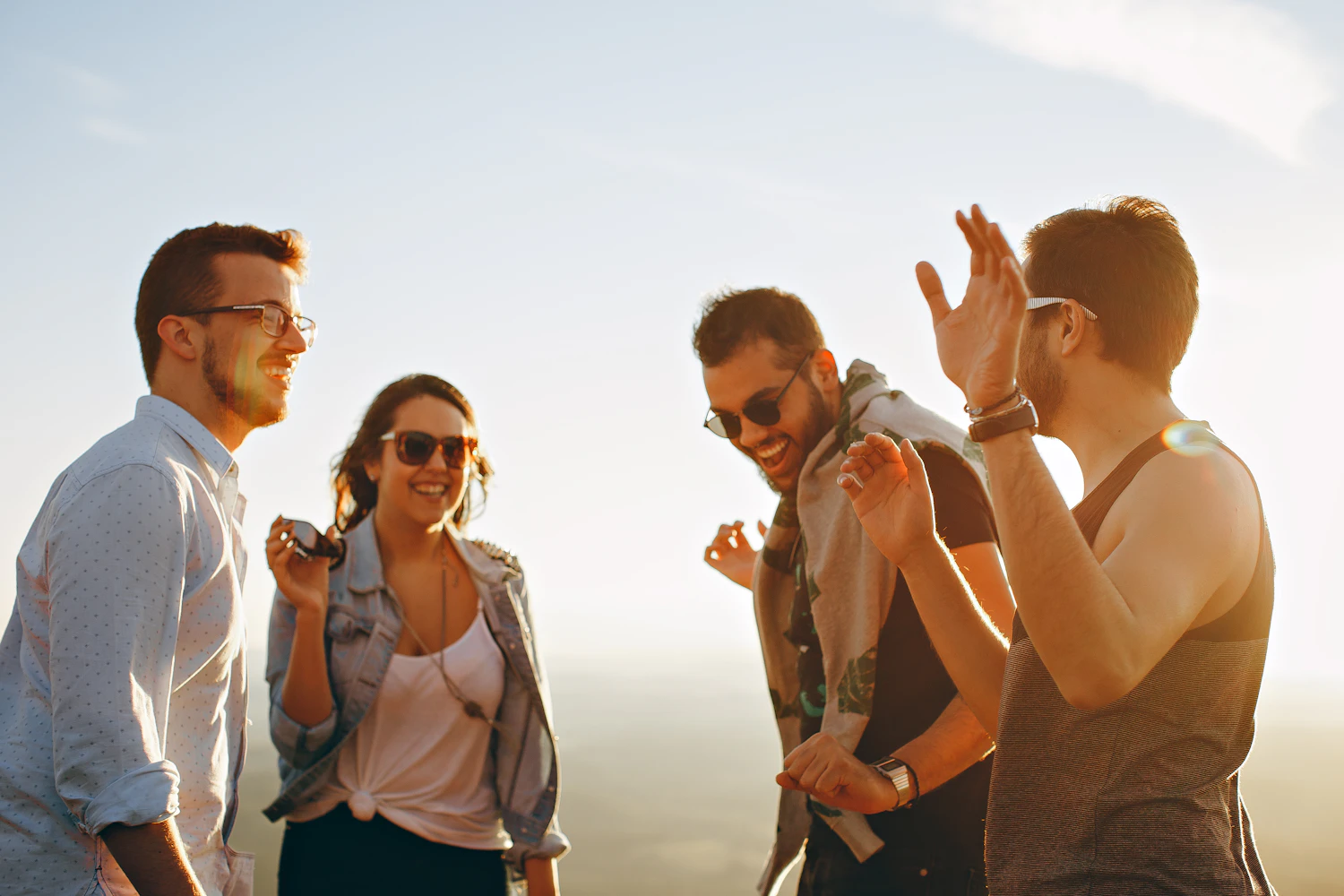 Friends chatting together outdoors